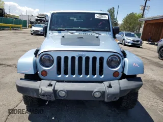 2012 Jeep Wrangler Arctic z VIN 1C4AJWBGXCL156600, wystawiony jako Copart lot #56369065 z przebiegiem 216 808 mil mil oraz Szkoda całkowita • Salvage title. Historia ofert i sprzedaży dostępna na DreamBid. Obrazek 5.