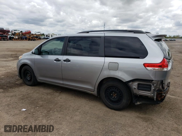 2011 Toyota Sienna z VIN 5TDZK3DC3BS016426, wystawiony jako Copart lot #57070075 z przebiegiem 270 749 mil mil oraz Szkoda całkowita • Salvage title. Historia ofert i sprzedaży dostępna na DreamBid. Obrazek 2.