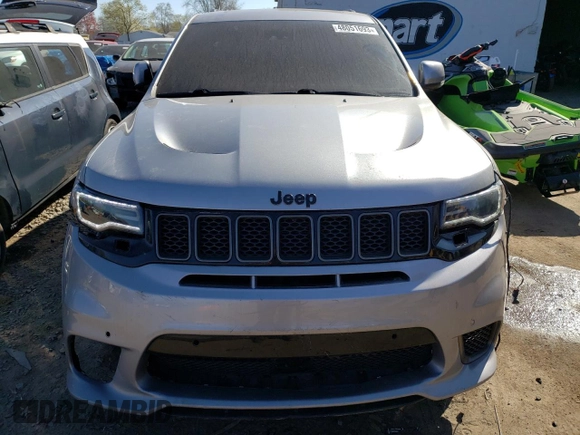 2018 Jeep Grand Cherokee with VIN NJ1454E, listed as a Copart auction lot 48051693 with 66,894 mi miles and Salvage title. Bid and sale history available at DreamBid. Image 5.
