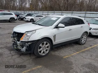 2014 Cadillac SRX Premium Collection z VIN 3GYFNDE34ES548826, wystawiony jako IAAI lot #40792942 z przebiegiem 115 984 mil mil oraz . Historia ofert i sprzedaży dostępna na DreamBid. Obrazek 19.