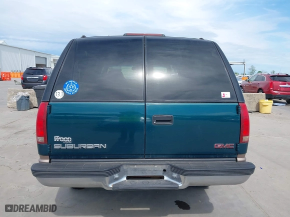 1998 GMC Suburban with VIN 1GKGK26J4WJ734958, listed as a IAAI auction lot 41878070 with 131,528 mi miles. Bid and sale history available at carsss.com. Image 16.