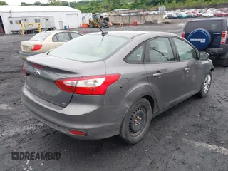 2012 Ford Focus SE z VIN 1FAHP3F29CL442731, wystawiony jako IAAI lot #42517796 z przebiegiem 148 728 mil mil oraz . Historia ofert i sprzedaży dostępna na DreamBid. Obrazek 4.