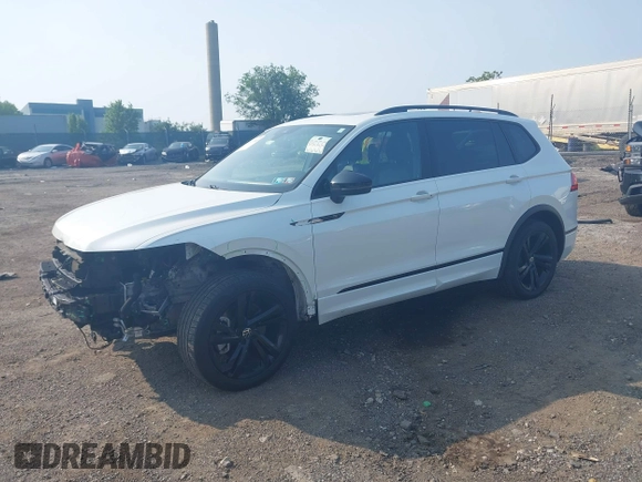 2023 Volkswagen Tiguan SE R-Line Black z VIN 3VV8B7AX9PM055640, wystawiony jako IAAI lot #42411380 z przebiegiem 68 922 mil mil oraz . Historia ofert i sprzedaży dostępna na DreamBid. Obrazek 16.