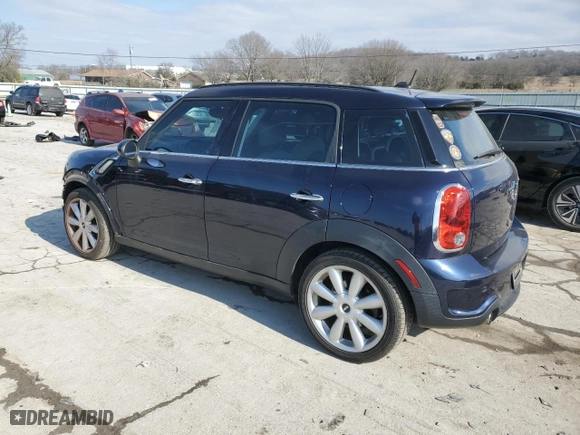 2014 MINI Cooper Countryman S with VIN WMWZC3C5XEWP25131, listed as a Copart auction lot 42112515 with 90,513 mi miles and Salvage Title. Bid and sale history available at carsss.com. Image 2.