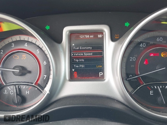2014 Dodge Journey SXT with VIN 3C4PDCBG9ET209357, listed as a IAAI auction lot 42257467 with 121,786 mi miles and . Bid and sale history available at DreamBid. Image 7.