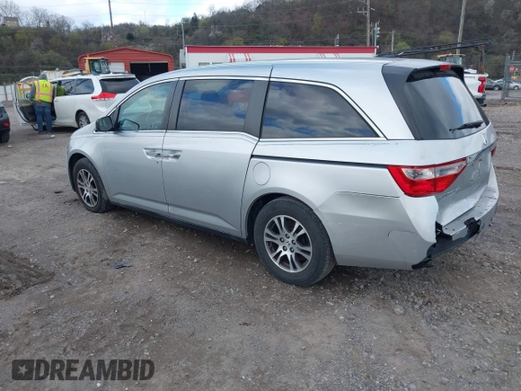 2011 Honda Odyssey EX-L with VIN 5FNRL5H60BB012206, listed as a IAAI auction lot 41982987 with 220,913 mi miles and . Bid and sale history available at carsss.com. Image 3.