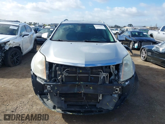 2014 Cadillac SRX Performance Collection with VIN 3GYFNCE39ES544135, listed as a IAAI auction lot 41808644 with 145,772 mi miles and . Bid and sale history available at carsss.com. Image 13.