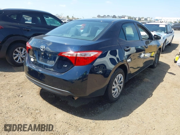 2019 Toyota Corolla L with VIN 2T1BURHE6KC185004, listed as a IAAI auction lot 42105629 with 111,907 mi miles. Bid and sale history available at carsss.com. Image 4.