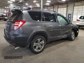 2010 Toyota RAV4 Sport with VIN JTMRK4DV8A5085818, listed as a Copart auction lot 51799295 with 115,109 mi miles and Salvage title. Bid and sale history available at DreamBid. Image 3.