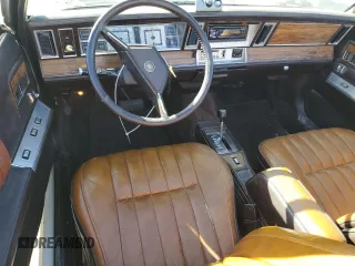 1982 Chrysler LeBaron z VIN 1C3BC55D3CG173312, wystawiony jako Copart lot #80800174 z przebiegiem 48 391 mil mil oraz Tytuł czysty. Historia ofert i sprzedaży dostępna na DreamBid. Obrazek 8.