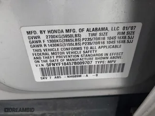2007 Honda Pilot EX with VIN 5FNYF18457B009707, listed as a IAAI auction lot 42030214 with 229,462 mi miles. Bid and sale history available at carsss.com. Image 9.