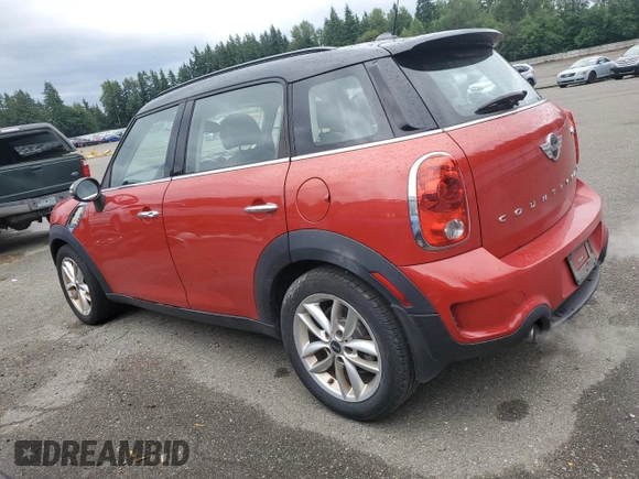 2014 MINI Countryman S with VIN WMWZC3C53EWP25410, listed as a Copart auction lot 62900915 with 122,088 mi miles and Clean title. Bid and sale history available at DreamBid. Image 2.