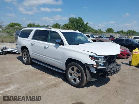 2020 Chevrolet Suburban Premier with VIN 1GNSCJKC9LR125292, listed as a IAAI auction lot 42073858 with 92,363 mi miles and . Bid and sale history available at DreamBid. Image 1.