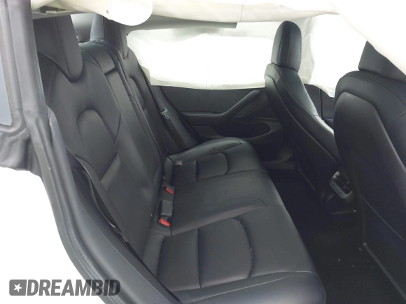 2020 Tesla Model 3 Standard Range Plus z VIN 5YJ3E1EA3LF590450, wystawiony jako IAAI lot #42026296 z przebiegiem 68 242 mil mil oraz . Historia ofert i sprzedaży dostępna na DreamBid. Obrazek 8.