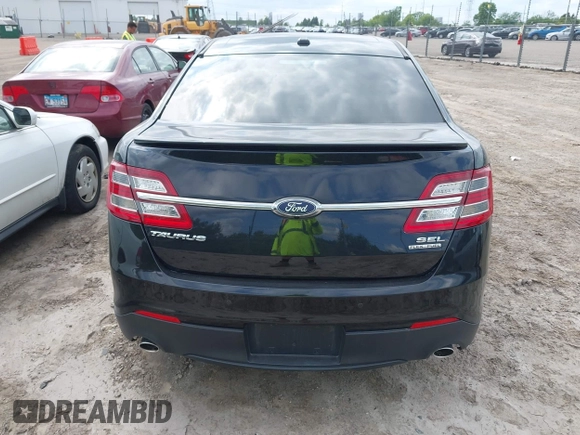 2016 Ford Taurus SEL z VIN 1FAHP2E82GG156346, wystawiony jako IAAI lot #42468616 z przebiegiem 159 425 mil mil oraz . Historia ofert i sprzedaży dostępna na DreamBid. Obrazek 16.