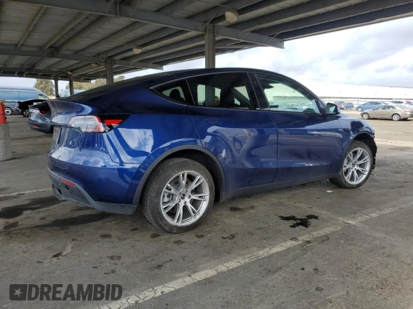 2024 Tesla Model Y Long Range with VIN 7SAYGDEE6RF025366, listed as a Copart auction lot 49328055 with 10,319 mi miles and Salvage Title. Bid and sale history available at DreamBid. Image 3.