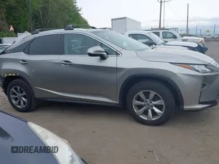 2018 Lexus RX 350 z VIN 2T2BZMCA4JC157690, wystawiony jako IAAI lot #42155397 z przebiegiem 104 075 mil mil oraz . Historia ofert i sprzedaży dostępna na DreamBid. Obrazek 14.
