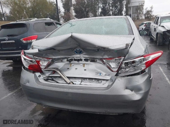 2016 Toyota Camry Hybrid LE with VIN 4T1BD1FKXGU196930, listed as a IAAI auction lot 41694789 with 89,149 mi miles. Bid and sale history available at carsss.com. Image 17.