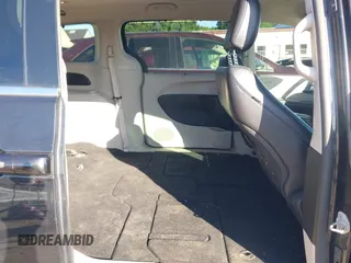 2022 Chrysler Pacifica Touring L with VIN 2C4RC1BG9NR117538, listed as a IAAI auction lot 42318518 with 103,311 mi miles and . Bid and sale history available at DreamBid. Image 8.