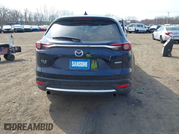2021 Mazda CX-9 Grand Touring with VIN JM3TCBDY7M0540359, listed as a IAAI auction lot 41711366 with 47,391 mi miles and . Bid and sale history available at carsss.com. Image 16.