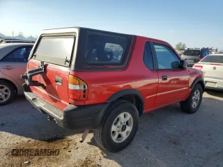 1999 Isuzu Rodeo z VIN 4S2CK57W3X4301044, wystawiony jako Copart lot #75758024 z przebiegiem 209 456 mil mil oraz Tytuł czysty. Historia ofert i sprzedaży dostępna na DreamBid. Obrazek 3.