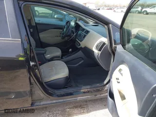 2013 Kia Rio EX with VIN KNADN4A39D6096262, listed as a IAAI auction lot 41094665 with 120,919 mi miles. Bid and sale history available at carsss.com. Image 5.