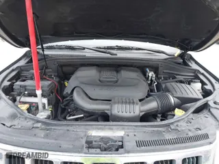 2011 Jeep Grand Cherokee Laredo with VIN 1J4RR4GG9BC546198, listed as a IAAI auction lot 41879387 with 190,973 mi miles. Bid and sale history available at carsss.com. Image 10.