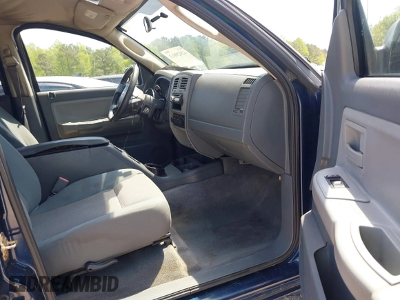 2005 Dodge Dakota SLT with VIN 1D7HW48N05S113487, listed as a IAAI auction lot 42029813 with 229,025 mi miles. Bid and sale history available at carsss.com. Image 5.