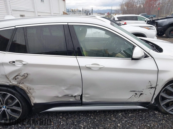 2017 BMW X1 xDrive28i with VIN WBXHT3C36H5F74818, listed as a IAAI auction lot 41853836 with 71,735 mi miles and . Bid and sale history available at DreamBid. Image 13.