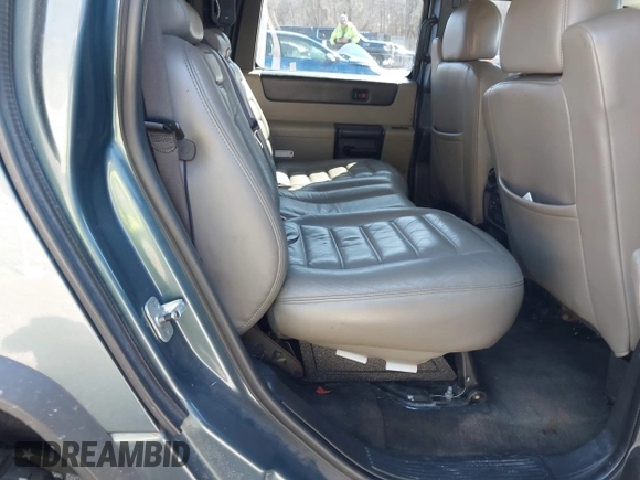 2005 Hummer H2 SUT with VIN 5GRGN22U85H107090, listed as a IAAI auction lot 41514241 with 202,119 mi miles. Bid and sale history available at carsss.com. Image 8.