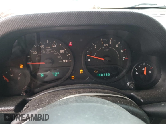 2007 Jeep Wrangler Unlimited X with VIN 1J4GA39117L119395, listed as a Copart auction lot 52588055 with 160,335 mi miles and Salvage title. Bid and sale history available at DreamBid. Image 9.