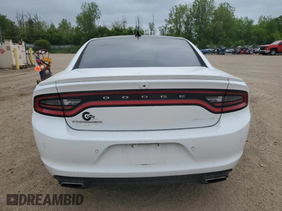 2015 Dodge Charger SXT with VIN 2C3CDXJG7FH779296, listed as a Copart auction lot 58490215 with 173,371 mi miles and Clean title. Bid and sale history available at DreamBid. Image 6.