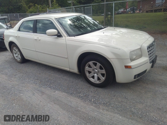 2005 Chrysler 300 Touring with VIN 2C3AA53G75H663208, listed as a IAAI auction lot 42180449 with 353,034 mi miles and . Bid and sale history available at carsss.com. Image 1.