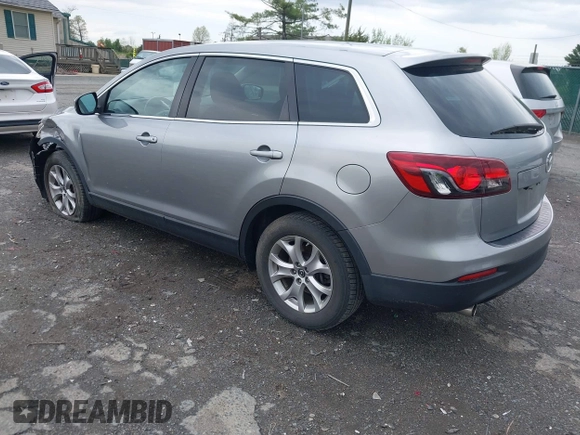 2015 Mazda CX-9 Sport with VIN JM3TB3BV2F0454770, listed as a IAAI auction lot 42009879 with 98,916 mi miles and . Bid and sale history available at carsss.com. Image 3.