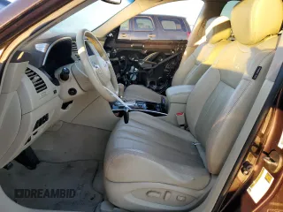 2013 Infiniti FX z VIN JN8CS1MU3DM140055, wystawiony jako Copart lot #80255094 z przebiegiem 153 575 mil mil oraz Szkoda całkowita • Salvage title. Historia ofert i sprzedaży dostępna na DreamBid. Obrazek 7.