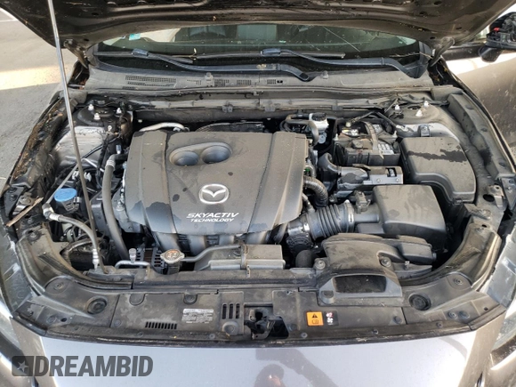 2018 Mazda 3 Touring z VIN 3MZBN1L30JM195471, wystawiony jako Copart lot #57497115 z przebiegiem 147 899 mil mil oraz Szkoda całkowita • Salvage title. Historia ofert i sprzedaży dostępna na DreamBid. Obrazek 11.