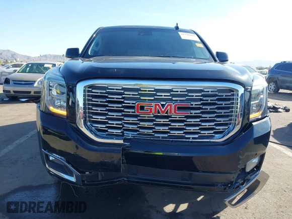 2018 GMC Yukon Denali with VIN 1GKS1CKJ1JR110344, listed as a IAAI auction lot 41720092 with 82,296 mi miles. Bid and sale history available at carsss.com. Image 6.