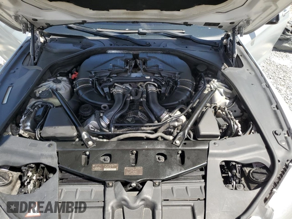 2013 BMW 6 Series 650i with VIN WBAYM9C59DDW20408, listed as a Copart auction lot 73585214 with 143,605 mi miles and Clean Title. Bid and sale history available at carsss.com. Image 12.