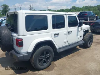 2021 Jeep Wrangler Unlimited Sahara with VIN 1C4HJXEN1MW618508, listed as a IAAI auction lot 42639515 with 39,747 mi miles and . Bid and sale history available at DreamBid. Image 4.