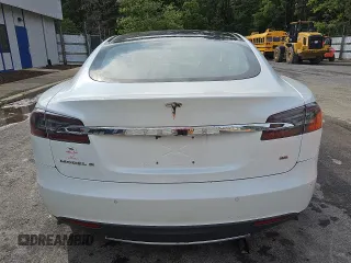 2013 Tesla Model S с VIN 5YJSA1CN1DFP27626, выставлен на аукционе Copart как лот 56697935 с пробегом 137 962 миль миль и Чистый • Clean title. История ставок и продаж доступна на DreamBid. Изображение 6.