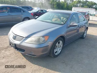 2006 Acura RL z VIN JH4KB16516C008190, wystawiony jako IAAI lot #42433002 z przebiegiem 216 426 mil mil oraz . Historia ofert i sprzedaży dostępna na DreamBid. Obrazek 2.