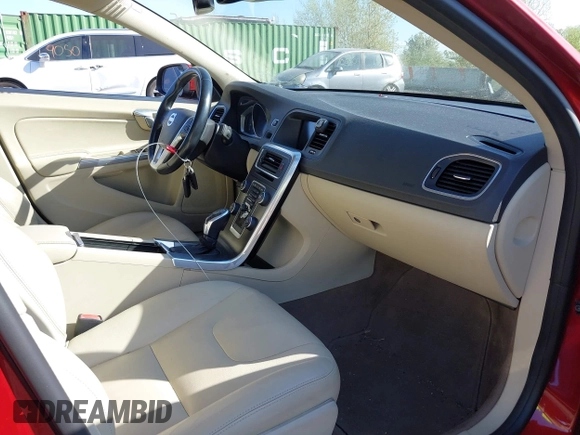 2015 Volvo S60 T5 Premier with VIN YV1612TB3F1309765, listed as a IAAI auction lot 42108221 with 103,874 mi miles. Bid and sale history available at carsss.com. Image 5.