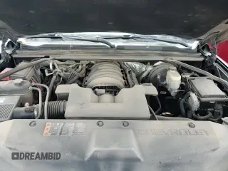 2018 Chevrolet Tahoe LT z VIN 1GNSKBKC7JR165103, wystawiony jako Copart lot #70960815 z przebiegiem 139 379 mil mil oraz Szkoda całkowita • Salvage title. Historia ofert i sprzedaży dostępna na DreamBid. Obrazek 14.