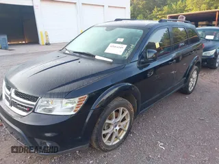 2015 Dodge Journey SXT with VIN 3C4PDCBG7FT556929, listed as a IAAI auction lot 42664149 with 191,980 mi miles and . Bid and sale history available at DreamBid. Image 2.