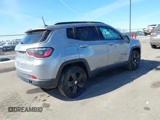 2022 Jeep Compass Latitude with VIN 3C4NJDBB6NT123062, listed as a IAAI auction lot 41770366 with 28,375 mi miles and . Bid and sale history available at DreamBid. Image 4.