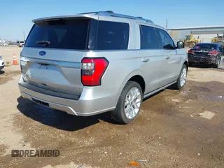 2018 Ford Expedition Platinum with VIN 1FMJU1MTXJEA21795, listed as a IAAI auction lot 42051613 with 90,922 mi miles and . Bid and sale history available at DreamBid. Image 4.