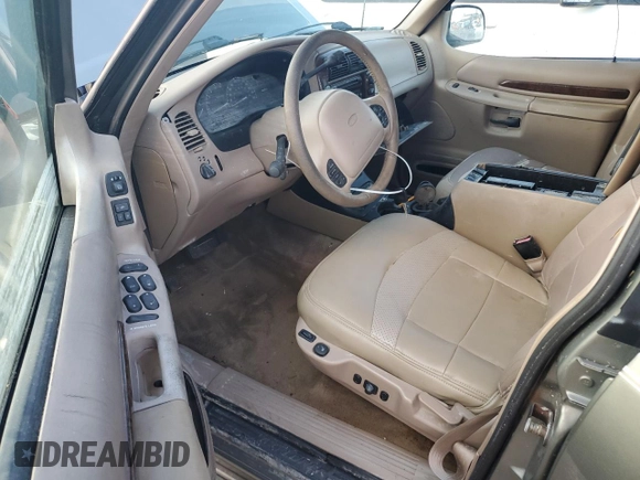 1999 Ford Explorer XLT z VIN 1FMZU34E3XZA39461, wystawiony jako Copart lot #74213774 z przebiegiem 119 937 mil mil oraz Szkoda całkowita • Salvage title. Historia ofert i sprzedaży dostępna na DreamBid. Obrazek 8.