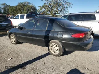 1999 Ford Escort LX with VIN 1FAFP10P5XW277376, listed as a Copart auction lot 82148204 with 127,634 mi miles and Salvage Title. Bid and sale history available at carsss.com. Image 2.
