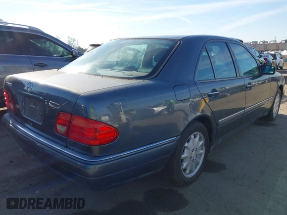 1997 Mercedes-Benz E 320 with VIN WDBJF55F7VA402305, listed as a IAAI auction lot 41865470 with 210,577 mi miles and . Bid and sale history available at DreamBid. Image 4.