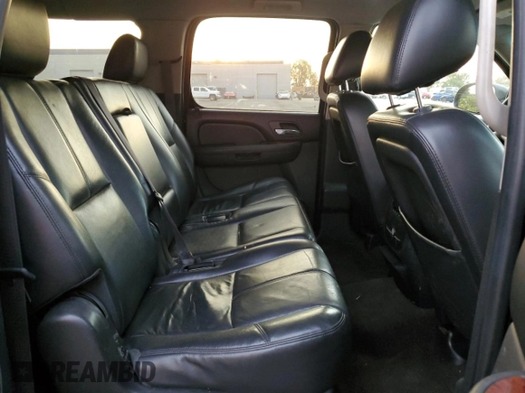 2014 Chevrolet Suburban LT with VIN 1GNSCJE00ER223194, listed as a Copart auction lot 70309624 with 150,009 mi miles and Salvage Title. Bid and sale history available at carsss.com. Image 11.